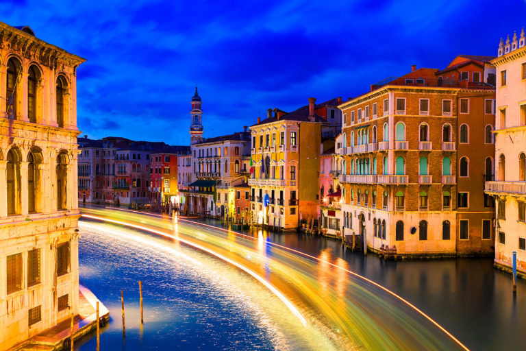 Venice, Italy - The Grand Canal and Light Trails of a Vessel